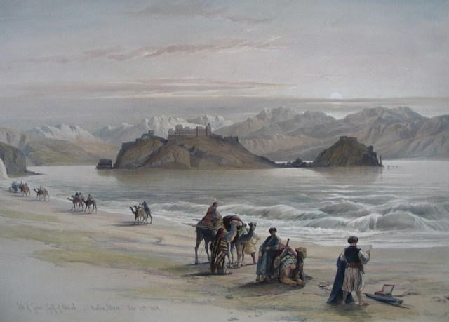 Camel caravans peacefully walk beside the water, with an island and mountains rising behind.