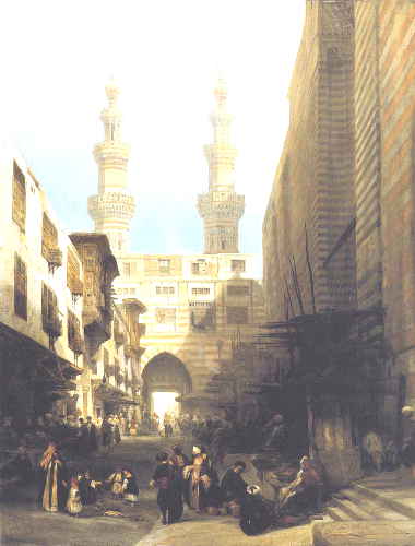 Twin minarets rise unnoticed above a busy market.